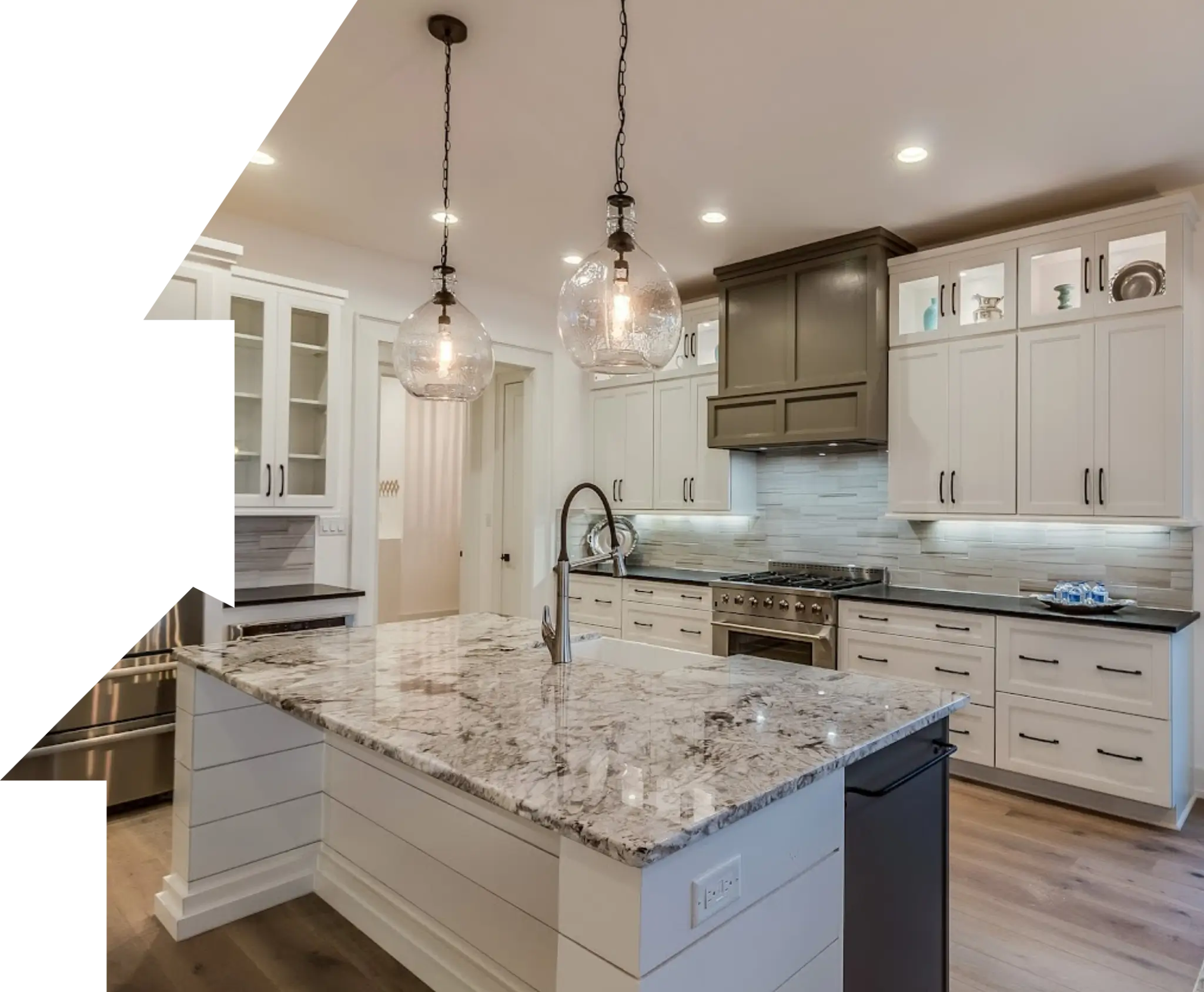Modern kitchen with marble island countertop.